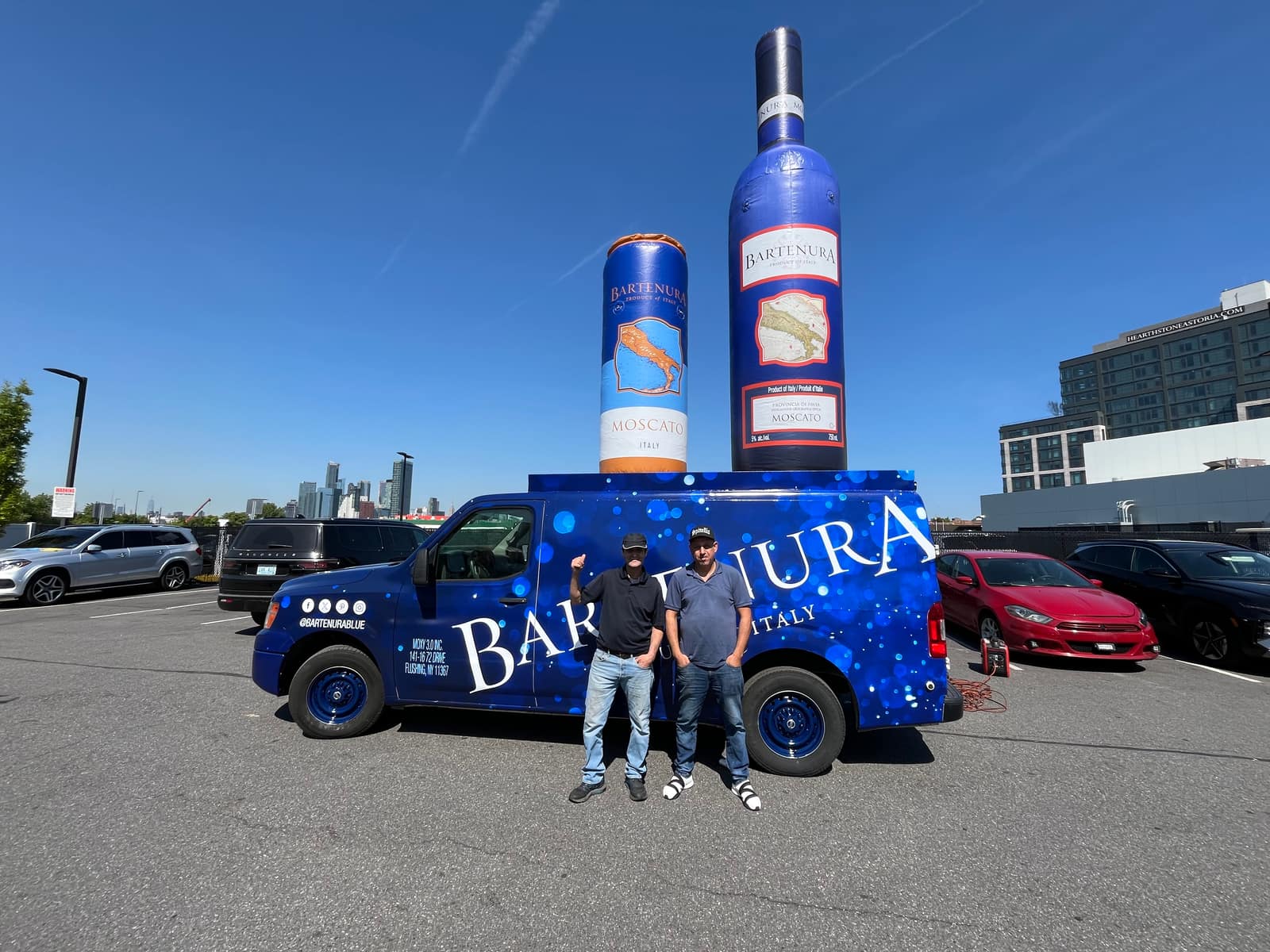Bartenura wrapped promo van with inflatable bottle at a brand activation in NYC